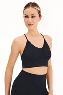 Bezszwowy krótki top sportowy Gabriella Seamless Top Flex ze skrzyżowanymi ramiączkami w kolorze czarnym rozmiar S/M #extras_black